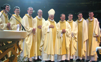 The eight new priests with their Bishop The eight new priests with their Bishop